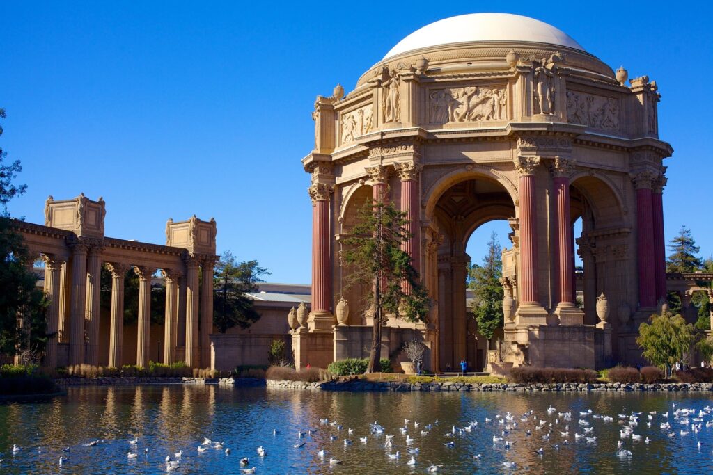 Palace of Fine Arts in San Francisco, a historic venue for live streaming events, featuring classical architecture and a reflective lagoon.