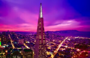 Transamerica Pyramid in San Francisco at night with vibrant city lights, a potential backdrop for venues for live streaming events