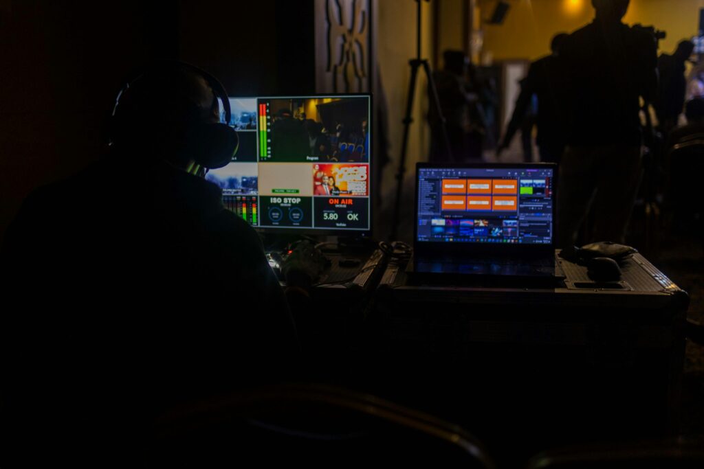 Professional live stream setup enhancing remote attendee engagement with multiple monitors