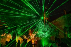 Event illuminated with green LED lighting showcasing sustainable AV practices